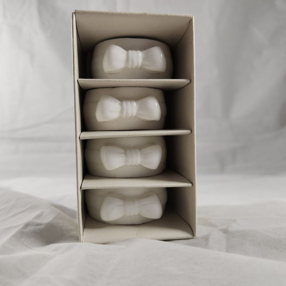 NOS Set Of 4 Knobler Taiwan Ceramic White Bowtie Napkin Rings 2 inch wide